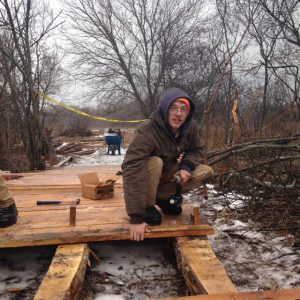 David Runstrom building SEEDS boardwalk at DY